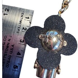 Previous Vivi Keychain Black and Gold Doll